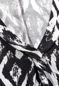 Cellbes of Sweden V-ringad, ärmlös trikåklänning Svart / Mönstrad Outlet